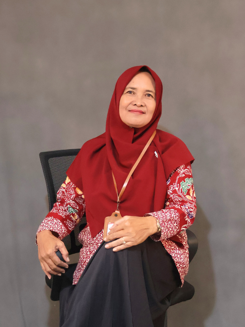 Dra. Tri Wahyuni, MM. Pd.